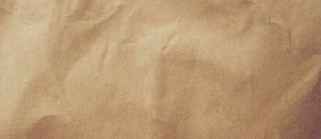 Close up crumpled brown paper texture and background with copy space photo