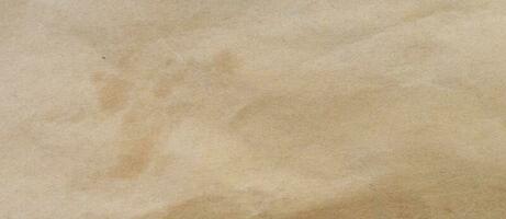 crumpled brown paper background and texture with copy  space. photo