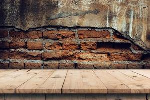 Brick wall background and empty wooden table display montage for product with copy space. photo