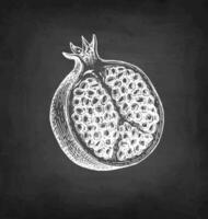 Pomegranate split open. Chalk sketch on blackboard background. Hand drawn vector illustration. Retro style.