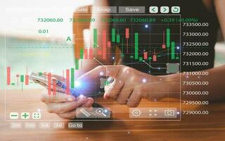 Businessman or trader displays a glowing virtual technical investment chart for stock market analysis, Financial Concepts and Banking Planning photo