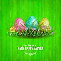 Easter green composition with a wood pattern, three eggs of different colors with a pattern, grass and flowers. vector