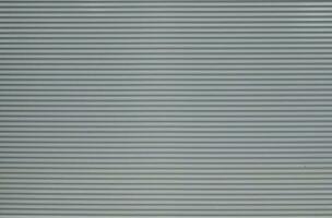 Gray metalic shutter background.  Roller shutter door texture background photo