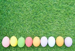 Close up Easter eggs on green grass photo