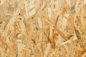 Close up texture of oriented strand board OSB photo