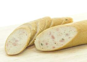 Sausage over cutting board photo