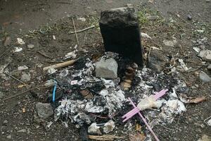 the remaining household waste that has been burned photo