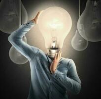 Ingenious head with light bulb photo