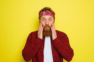 Wondered man with beard and bandana in head photo