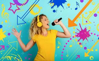 Girl with headset listens to music and song with microphone. emotional and energetic expression. Cyan background photo