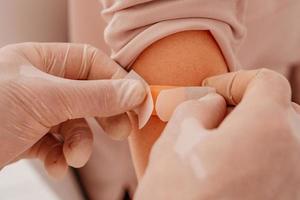 Patient with patch on the arm did the covid-19 vaccine photo