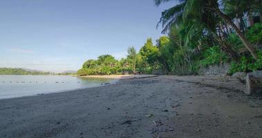 Timelapse natural beautiful view of sea white sand beach in sunny day in south of thailand, phuket, ocean sea in summer vacation holiday time background video