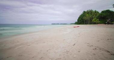 4K Time lapse of tropical sea beach landscape light of nature cloudscape sky and Clouds moving .Nature environment background video