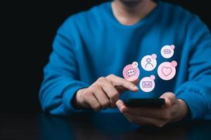 businessmen Are working on smartphones to use the search engine optimization tool. To find customers or promote and advertise online content for technology, marketing, and business concept. photo