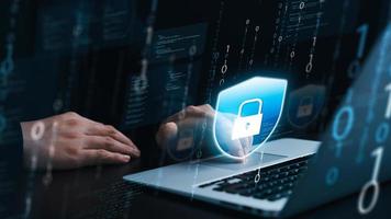 Cybersecurity concept, businessman using laptop access personal data security and banking and network security, Secure encryption. photo