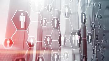 3d Digital composite image of people icons on office buildings background. photo