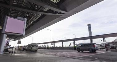 June 2,2022.Bangkok,Thailand.timelapse view many car arriving to departure terminal with many passenger at suvarnabhumi airport thailand reopening country video