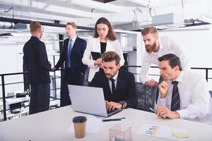 Businessperson in office connected on internet network. concept of partnership and teamwork photo