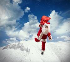 Running Santa Claus on snow photo