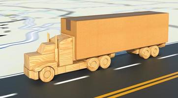 Wooden toy truck carrying a large cardboard box moves fast on the road. photo