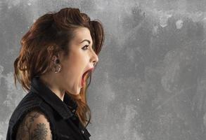 Astonished woman screaming photo