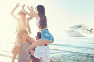 Happy smiling couples who travel by cruiseship. Concept of holiday and summertime photo