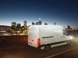 Fast van on a city road delivering at night. 3D Rendering photo