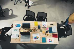 Team of businessmen work together in office. Concept of teamwork and partnership photo