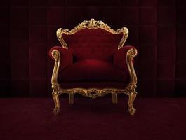 Red and gold luxury armchair into an old room photo