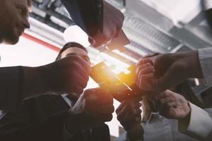 Teamwork of partners. Concept of integration and startup with puzzle pieces photo