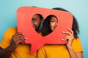 Couple are happy because receives hearts on social network photo