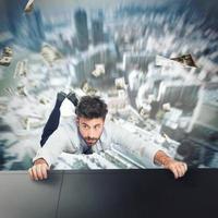 Businessman is going to fall photo