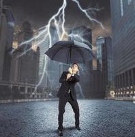 Businessman against lightning photo
