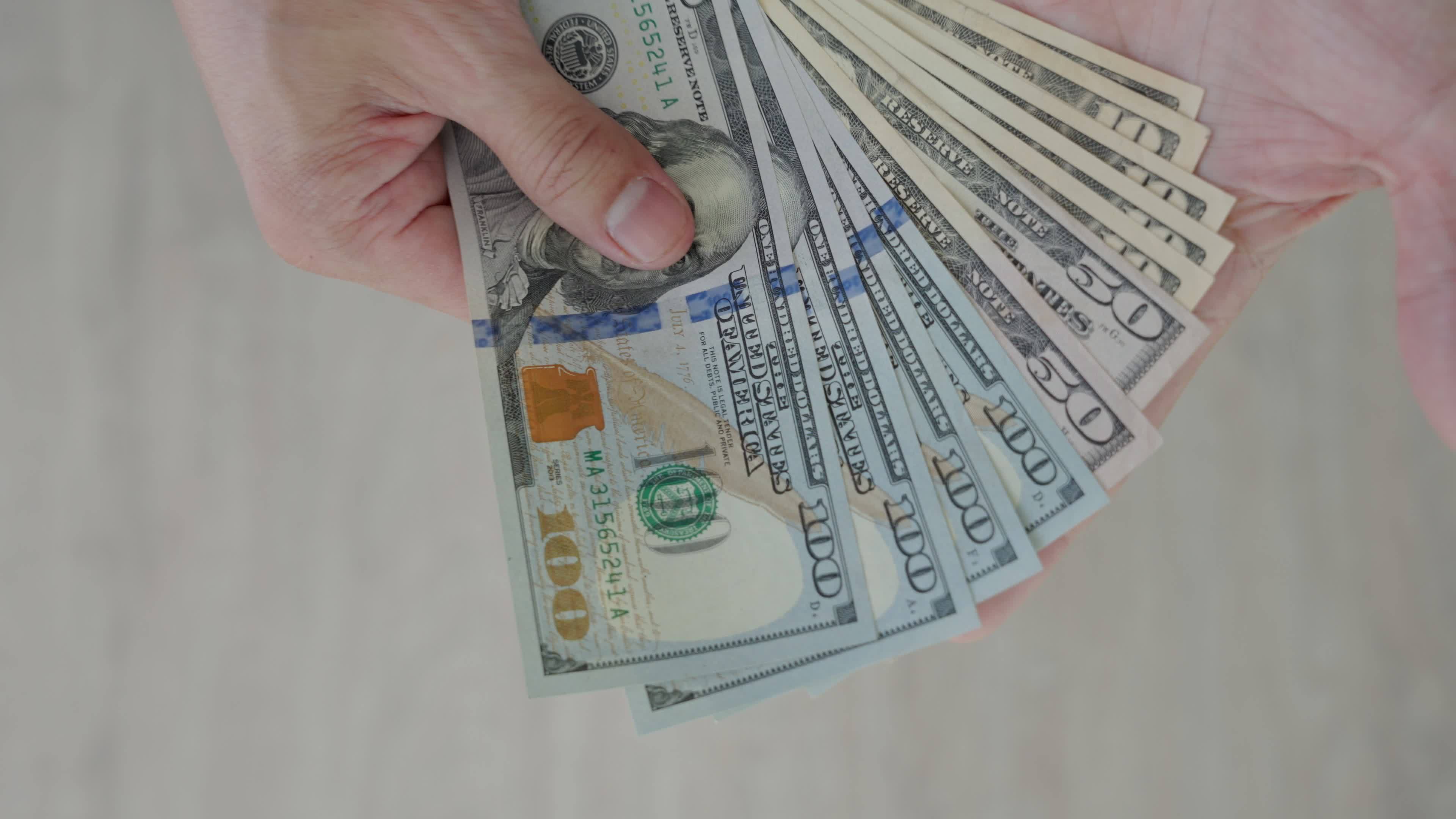 moneda-usd-muchos-billetes-de-banco-en-d-lares-colocados-sobre-la-mesa