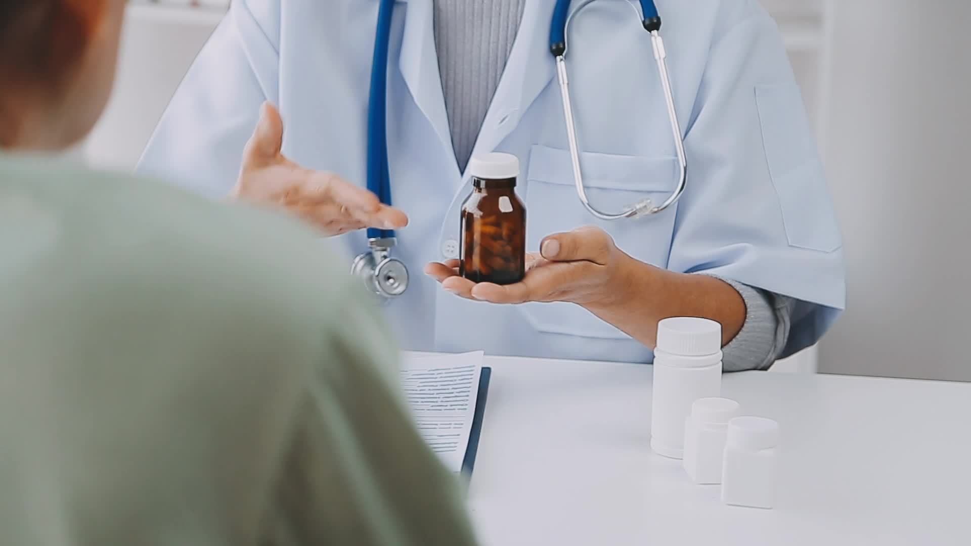 Close up of Female Doctor using stethoscope putting beat heart diagnose