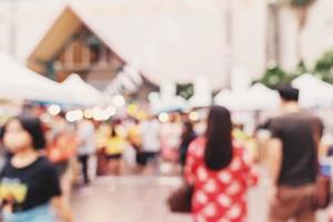 Abstract blur background crowd people in shopping mall for background, Vintage toned photo