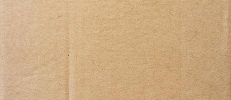 Brown cardboard sheet abstract background. texture of recycle paper box. photo
