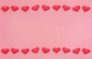 Red heart on pink pastel color background with space for text. photo