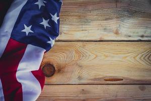 American flag on wooden background with copy space. photo