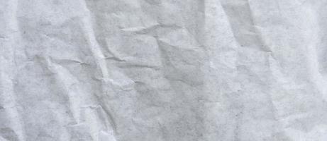 Crumpled paper texture and background with copy space photo
