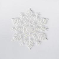 close up snowflake on white background. photo