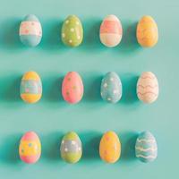 Colourful easter egg on pastel colour background photo