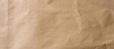 crumpled brown paper background and texture with copy  space. photo