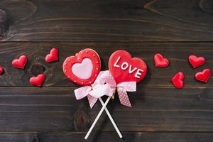 Valentines day heart shaped cookies on wooden table background with copy space. photo