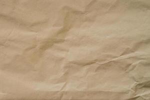 Kraft brown paper and crumpled background texture with space. photo