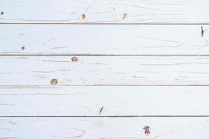 Old wooden plank painted in white color with copy space. photo
