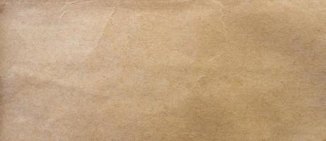 crumpled brown paper background and texture with copy  space. photo