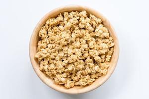 Bowl of Muesli and granola Isolated on White Top View. photo