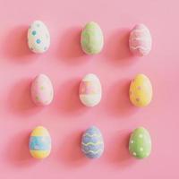 Colourful easter egg on pastel colour background photo