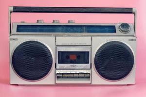 Vintage stereo on pink pastel color background photo